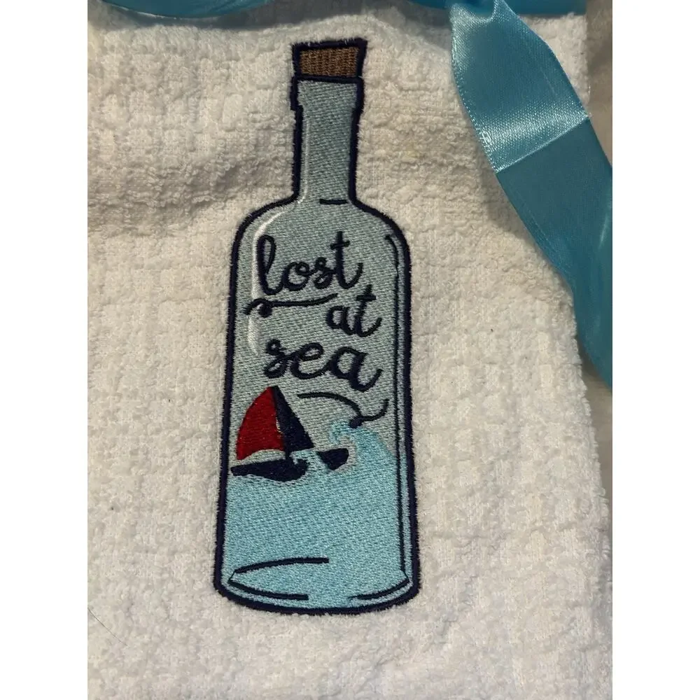 Nicole’s Kitchen Towels Waffle Texture Embroidered Lost At Sea Bottle White Blue